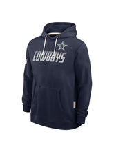 A navy blue Dallas Cowboys pullover hoodie with a white star logo and 'COWBOYS' text printed on the chest, displayed on a clean white background.