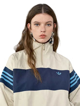 Color-block track jacket with elastic cuffs in stone and navy