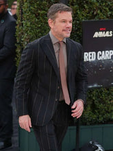 Black pinstripe suit with multiple pockets