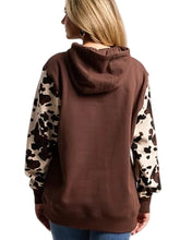 Brown cow print fleece hoodie with open-hem cuffs