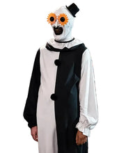 A person wearing a creepy clown costume in a retail store. The costume features a black and white split dress with black pom-poms, a white hood with a black topknot, and oversized orange flower-shaped glasses.