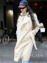 Beige cotton trench coat with double-breasted buttoned closure