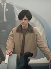 Beige jacket with two front and two inside pockets