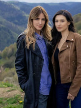 Black leather coat with full-length sleeves and front pockets