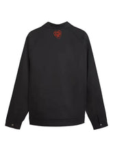 Motorsport-inspired black jacket with buttoned cuffs