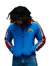 Blue track jacket with rib-knitted cuffs