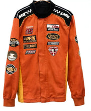 An orange and black racing jacket with multiple sponsor logos, featuring the number 95 and McQueen branding, displayed on a white background.