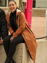 Brown hooded coat with full-length sleeves and front pockets