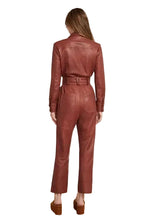 Front view of women’s brown leather one piece jumpsuit