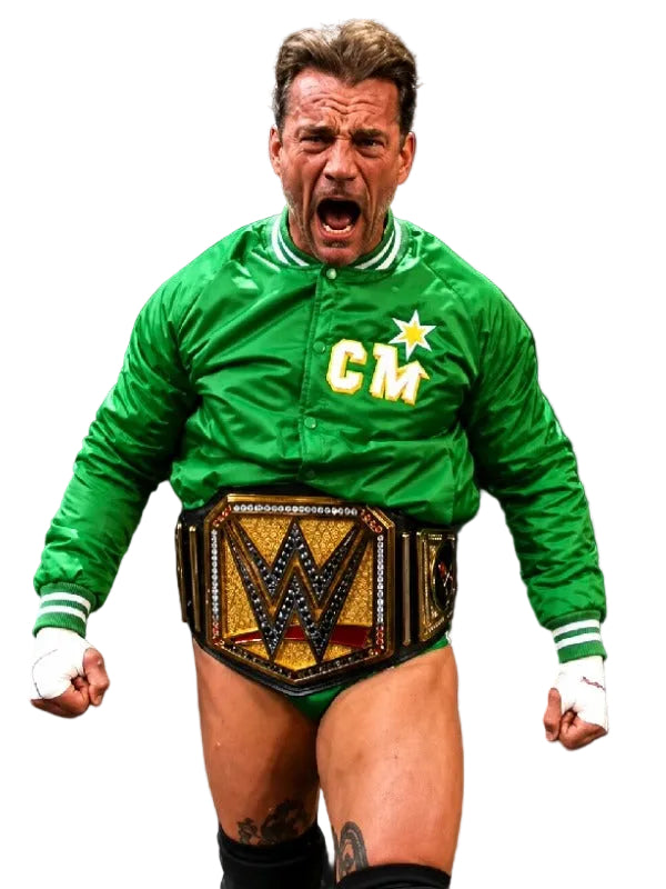 A man in a bright green bomber jacket with 'CM' and a star logo, wearing a WWE championship belt and white wrist wraps, standing against a black background with his mouth open in a shouting pose.