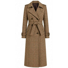 A long brown and beige plaid trench coat with a matching waist tie belt, shown on a plain white background.