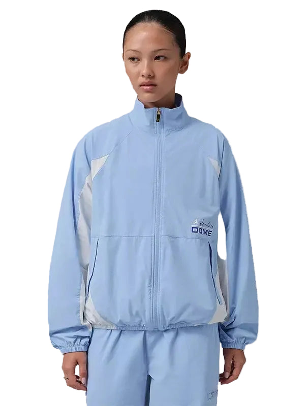 Blue women’s tunnel-style track jacket inspired by Space Jam