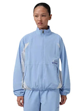 Blue women’s tunnel-style track jacket inspired by Space Jam