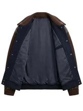 Kith Studded Varsity Jacket in navy and brown