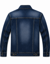 A dark blue denim jacket shown from the back, featuring classic stitching, button details on the cuffs and hem, and a clean white background.