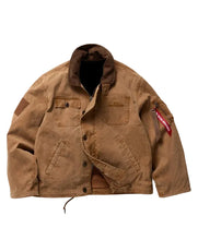 A brown military-style field jacket with a dark brown collar, featuring front flap pockets, a button closure, and a red and white '501st Regiment' patch on the right sleeve, laid flat against a light gray background.