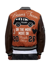 Brown wool varsity jacket with leather sleeves and ribbed cuffs