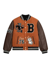 Brown wool varsity jacket with leather sleeves and ribbed cuffs
