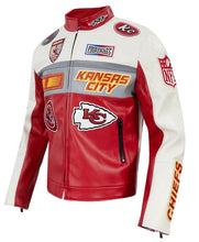 A red and white faux leather motorcycle jacket featuring Kansas City Chiefs team graphics, including the team logo, 'KANSAS CITY' text, and NFL shield patches.
