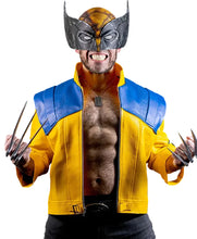 A man wearing a Wolverine costume, featuring a yellow and blue jacket, a mask, and metal claws, posed against a solid black background.