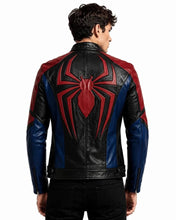 A man viewed from the back wearing a black leather jacket with a large red and blue Spider-Man style spider emblem on the back, paired with black pants, against a plain white background.