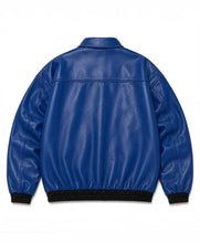 A royal blue faux leather jacket shown from the back, featuring a collar, long sleeves, and black ribbed knit trim at the cuffs and hem.