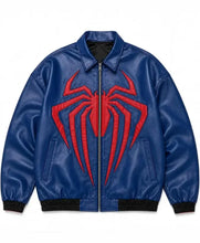 A blue faux leather bomber jacket featuring a large red Spider-Man web emblem on the front, with black ribbed trim at the collar, cuffs, and hem.