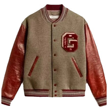 A varsity-style jacket with a taupe wool body, reddish-brown leather sleeves, and a red embroidered letter 'G' patch on the chest, shown against a light gray background.