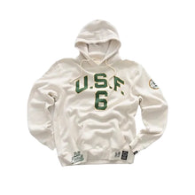 An off-white hooded sweatshirt with green 'U.S.