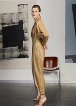 Women’s brown leather jumpsuit with spread collar
