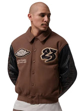 Wool varsity jacket featuring a rib-knitted collar and leather sleeves
