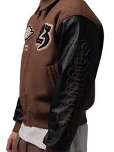 Air Jordan Flight Day of the Dead brown and black varsity jacket