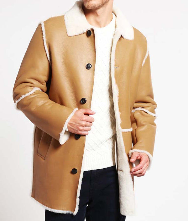 Men's tan shearling leather jacket with white fur trim and button closure